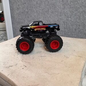 Hot Wheels Monster Jam 2010 Excaliber Black Truck Red Wheels Diecast Toy Cars‎
